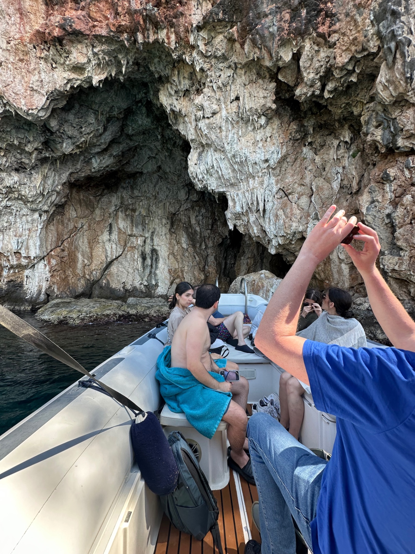 Inside a stalactite cave by boat near Himarë